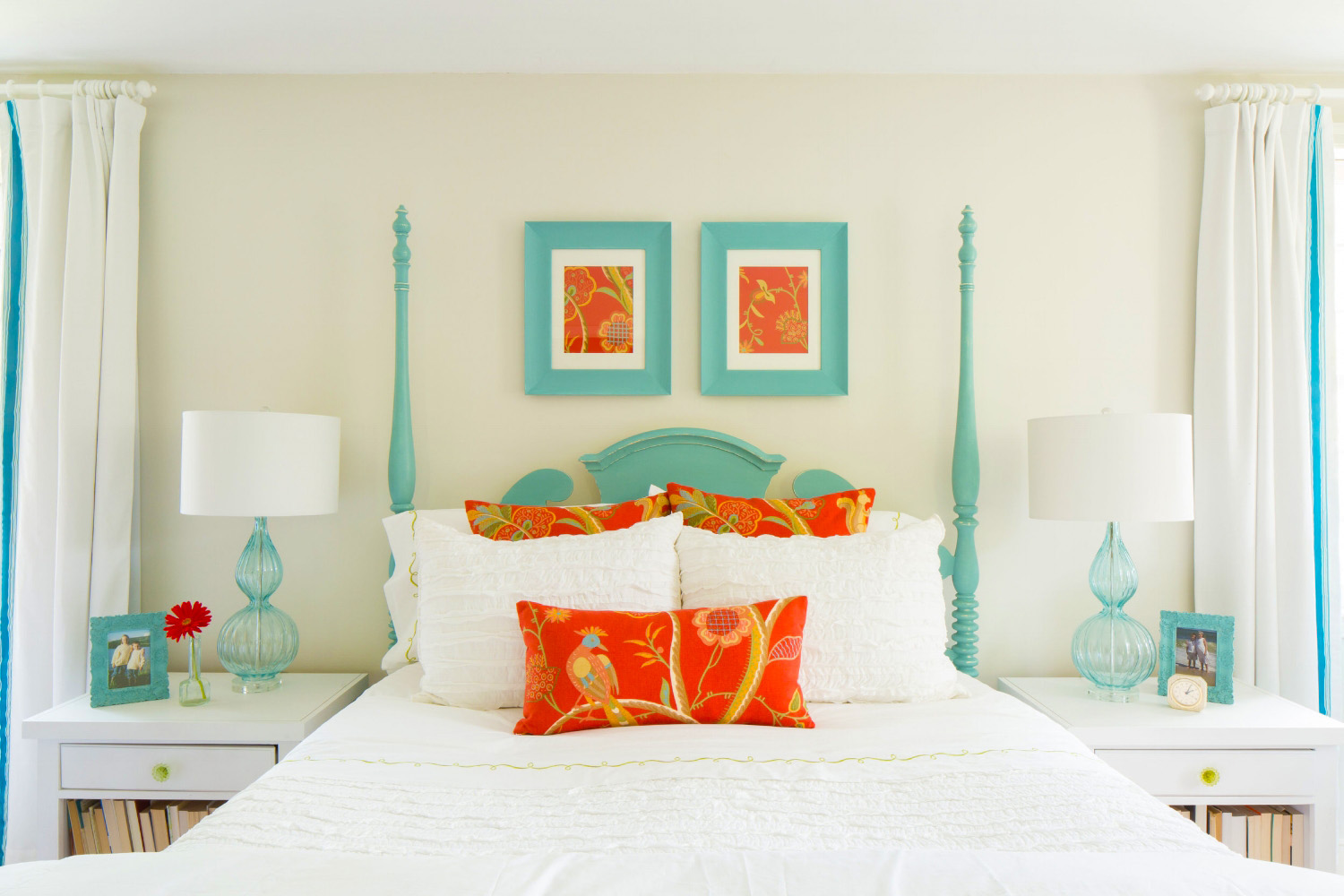 bedroom with bed and side tables and lamps and white bed linen plus cushions