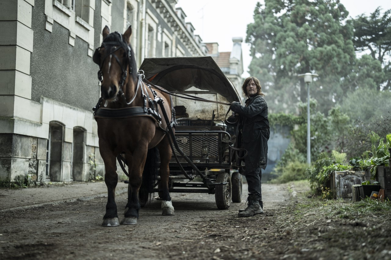 Daryl next to horse and buggy in The Walking Dead: Daryl Dixon