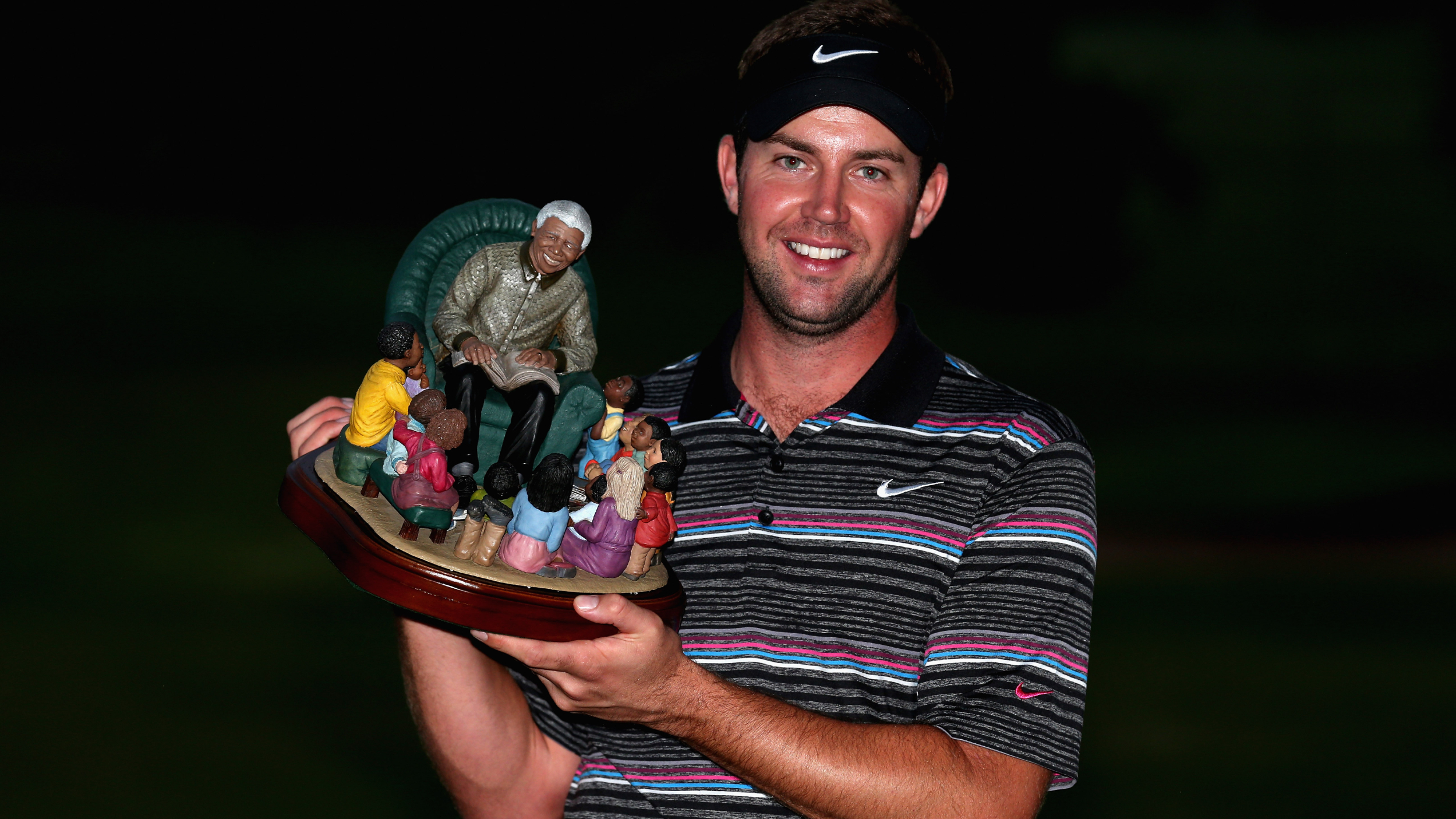 Scott Jamieson with the Nelson Mandela Championship trophy
