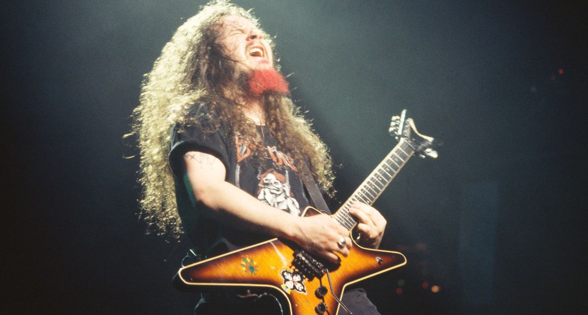 The red goateed Dimebag Darrell shreds on his Tobacco Sunburst Dean ML