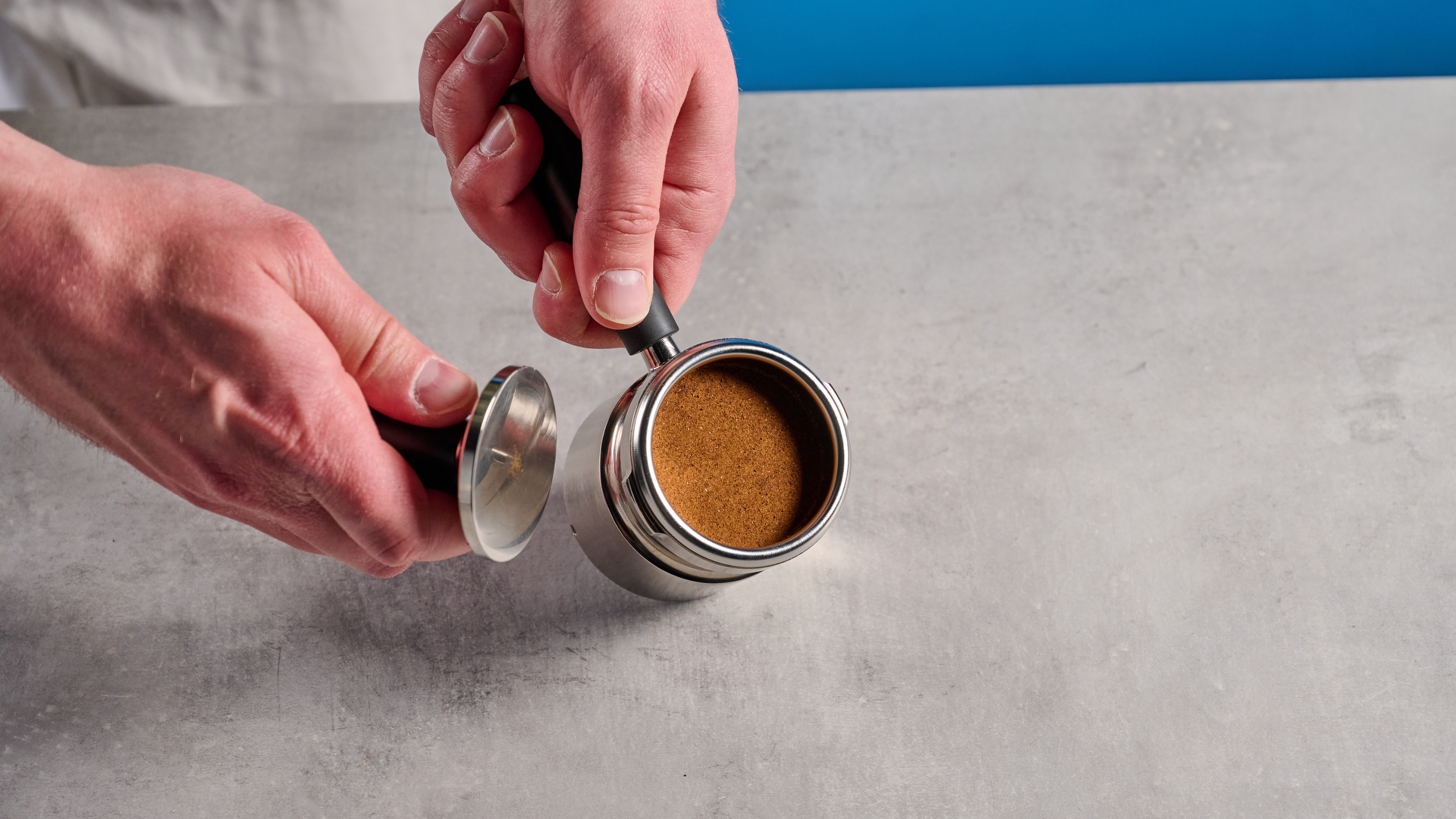 A coffee puck inside the 9Barista Espresso Machine Mk.2 basket