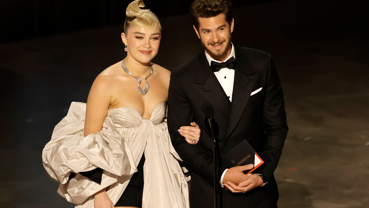 Florence Pugh and Andrew Garfield speak onstage during the 95th Annual Academy Awards at Dolby Theatre on March 12, 2023 in Hollywood, California