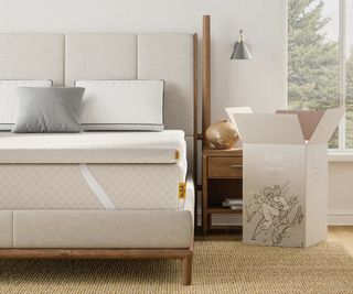 A Nolah Mattress Topper on a Nolah mattress in a contemporary bedroom