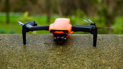 Autel Evo Nano Plus drone sat on a garden wall
