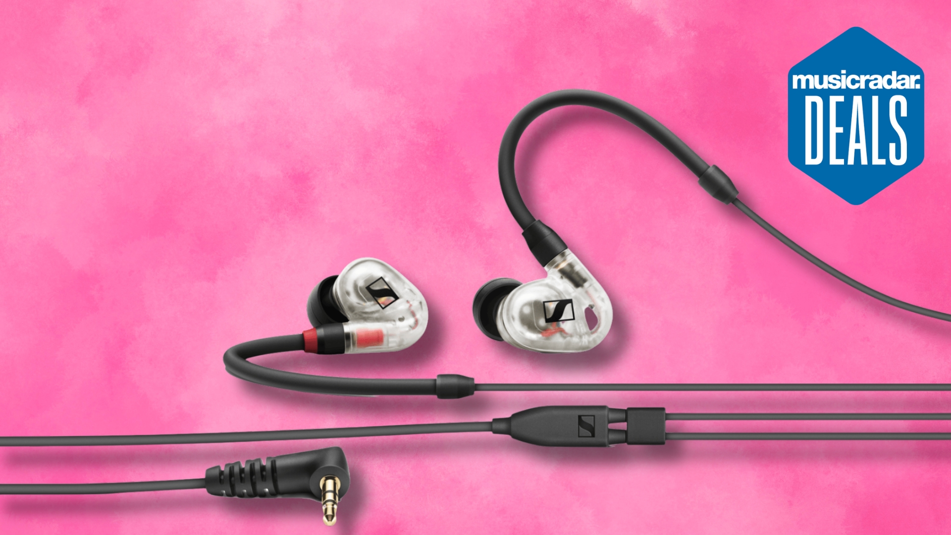 A pair of Sennheiser in-ear monitors on a pink background