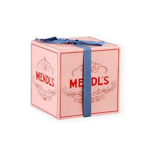 Pink Mendl's box on white background