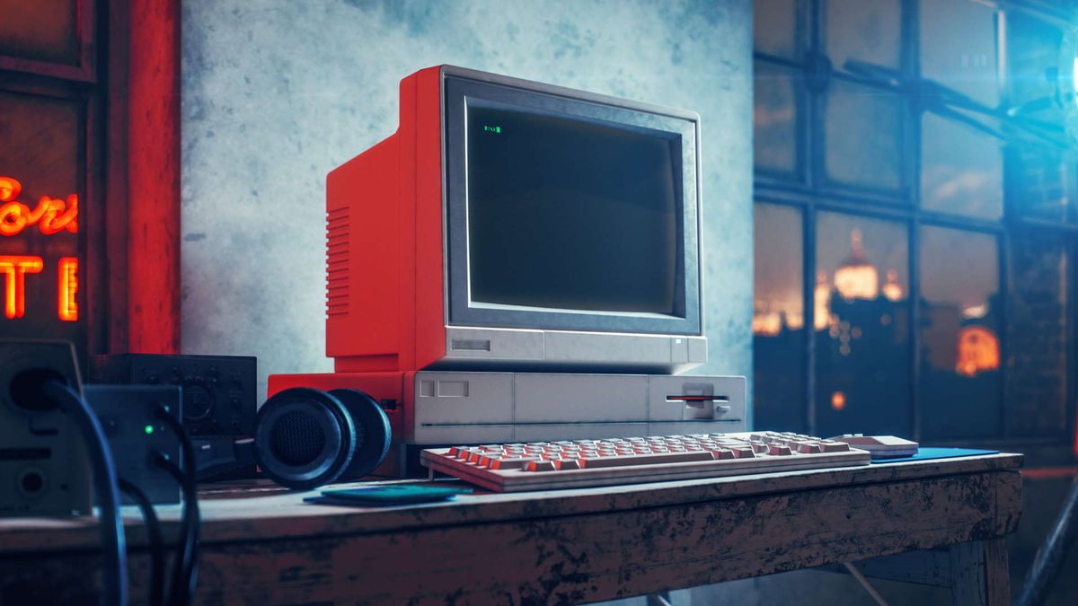 Beige box PC with a disk drive and black and green screen