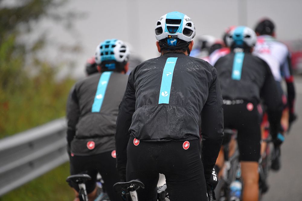 Team Sky are bundled up against the weather