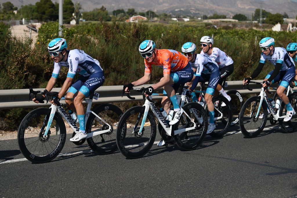ORIHUELA SPAIN FEBRUARY 02 LR Nicolo Buratti of Italy and Matej Mohoric of Slovenia and Team BahrainVictorious Orange Points Jersey compete during the 75th Volta a la Comunitat Valenciana 2024 Stage 3 a 1613km stage from San Vicente del Raspeig to Orihuela on February 02 2024 in Orihuela Spain Photo by Dario BelingheriGetty Images