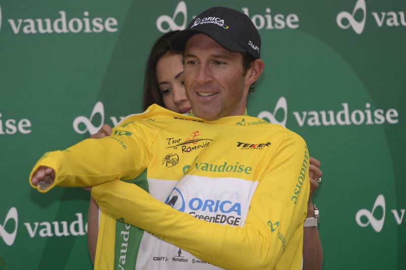 Michael Albasini (Orica-GreenEdge) enjoying pulling on the leaders jersey