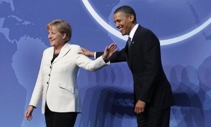 German Chancellor Angela Merkel and President Obama at last year's Nuclear summit: Germany will phase out nuclear energy, closing all 17 reactors, by 2022.