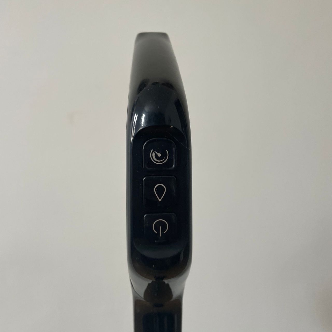 Close up of the handle controls of the Bissell Crosswave Omniforce Edge