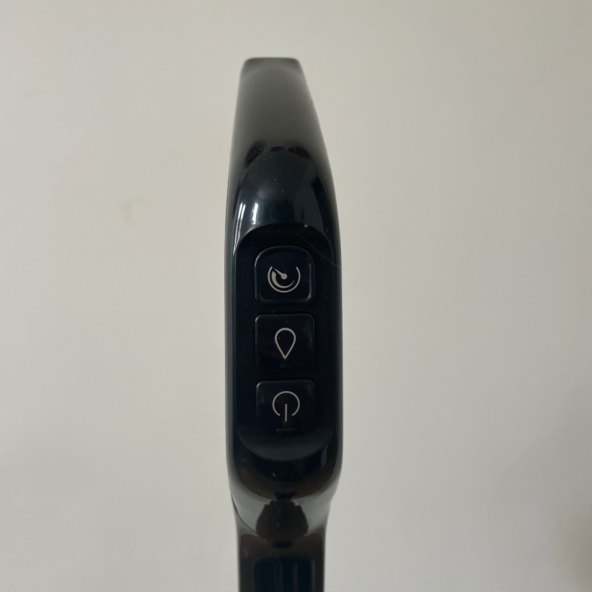 Close up of the handle controls of the Bissell Crosswave Omniforce Edge