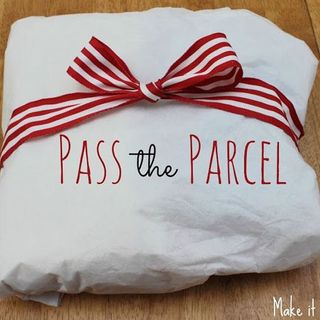 parcel with white coloured and red ribbon