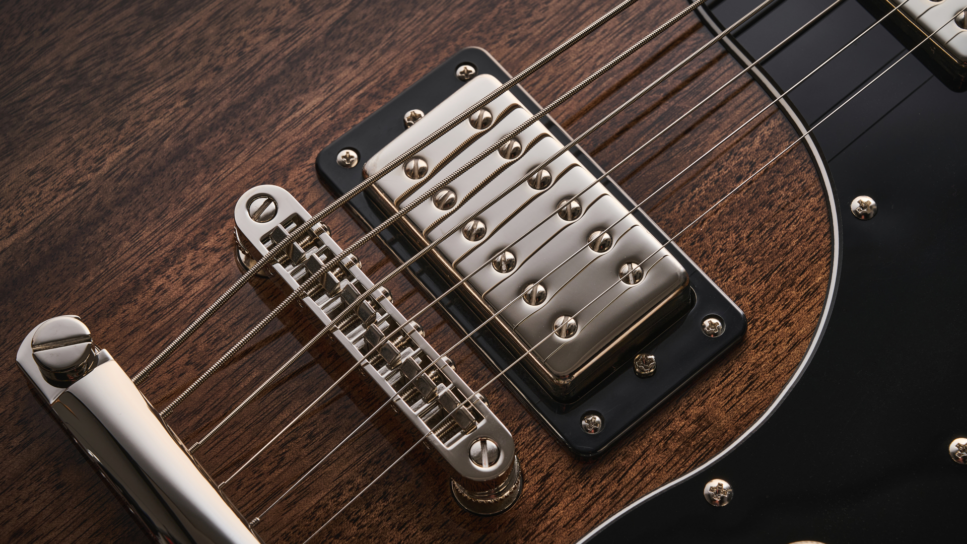 Gretsch Electromatic CVT Baritone in Bristol Fog brown sunburst finish shot on wood.