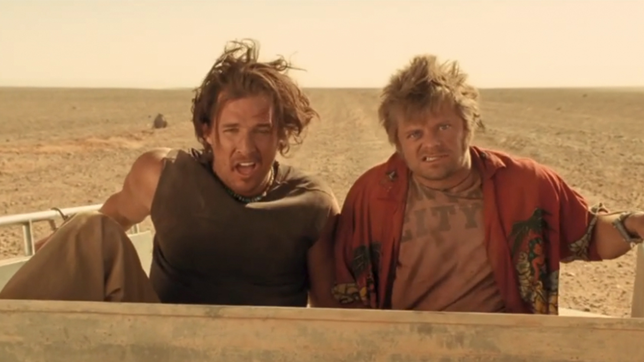 Matthew McCononaughey and Steve Zahn looking dusty and in pain in the desert in Sahara