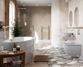 Beige bathroom with white sanitaryware, wooden bench and crazy paved flooring by Victoria Plum