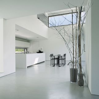 kitchen with white colour and dining table