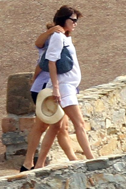 Nicolas Sarkozy and Carla Bruni-Sarkozy on holiday - baby bump - pregnant