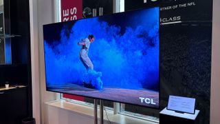 The TCL QM8 at a press event at CES 2024.
