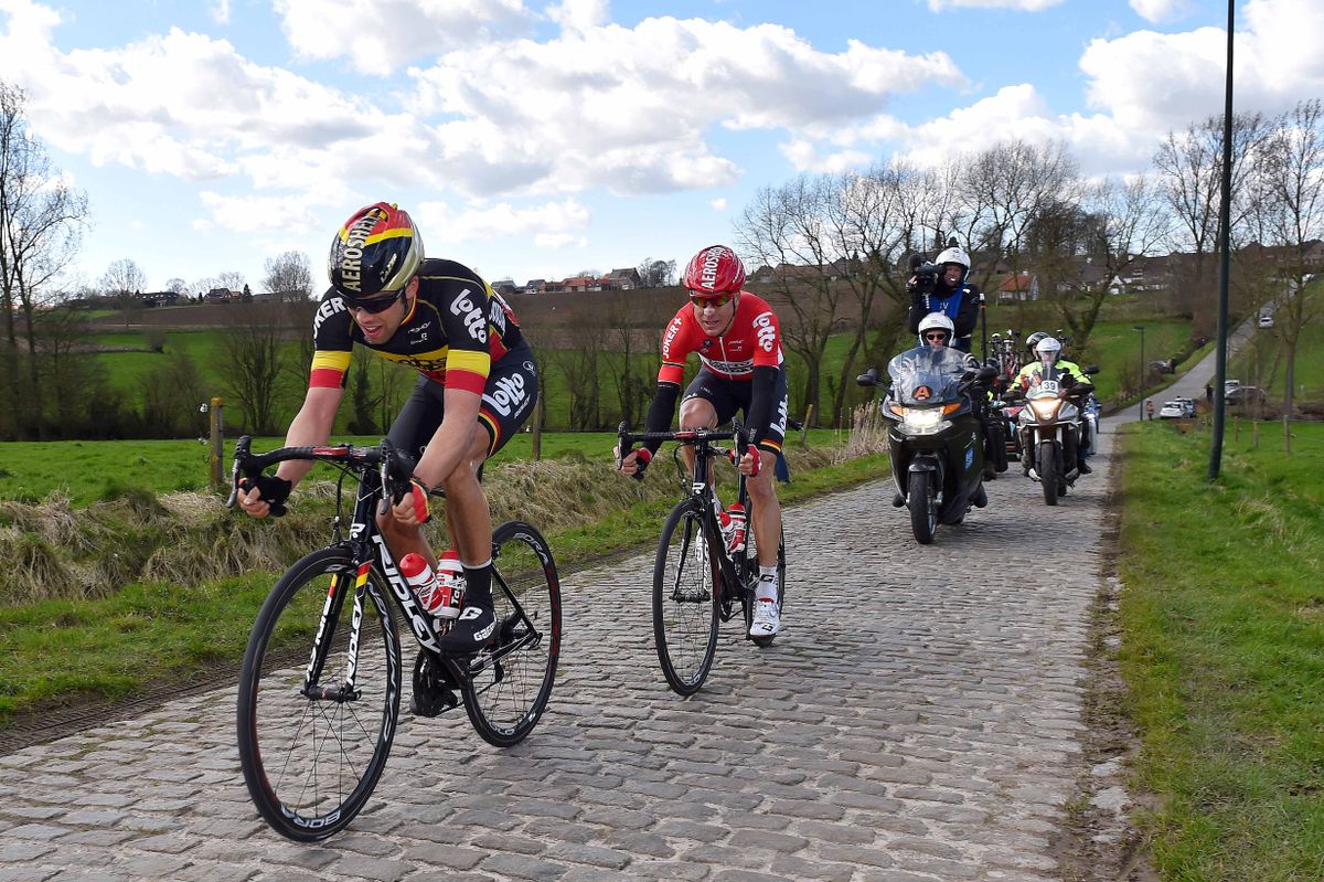 Jens Debusschere goes over the cobbles