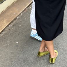 Women in Milan and Rome wearing colorful venetian slippers.