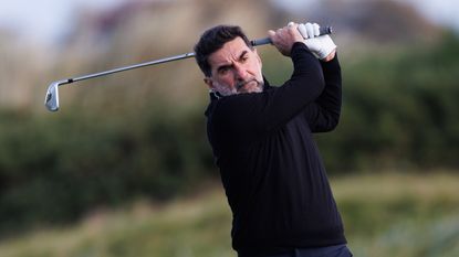 PIF chairman Yasir Al-Rumayyan hits an iron shot at the 2023 Alfred Dunhill Links Championship at St Andrews