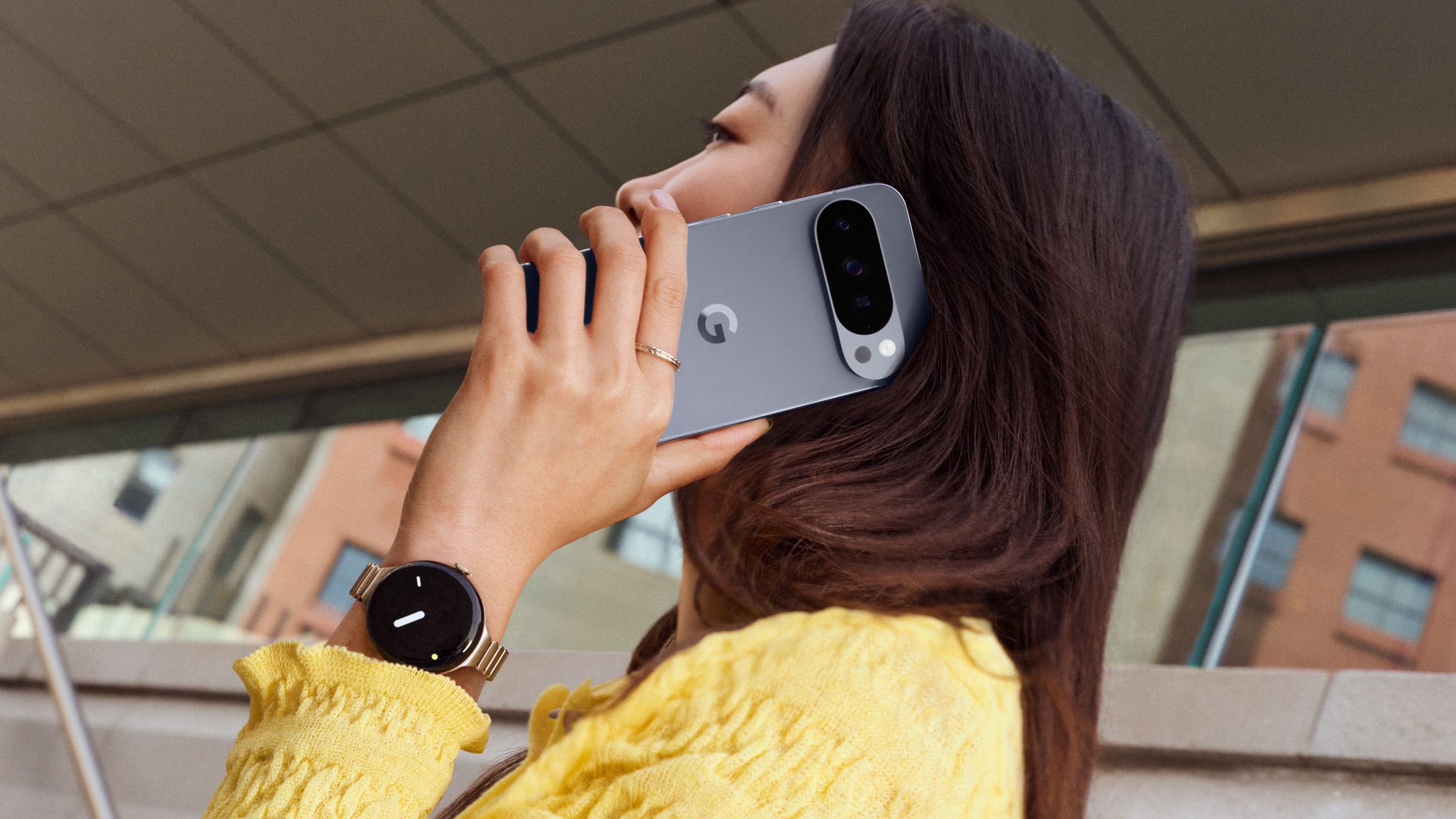 Person making a phone call on a Google Pixel 10 cell phone