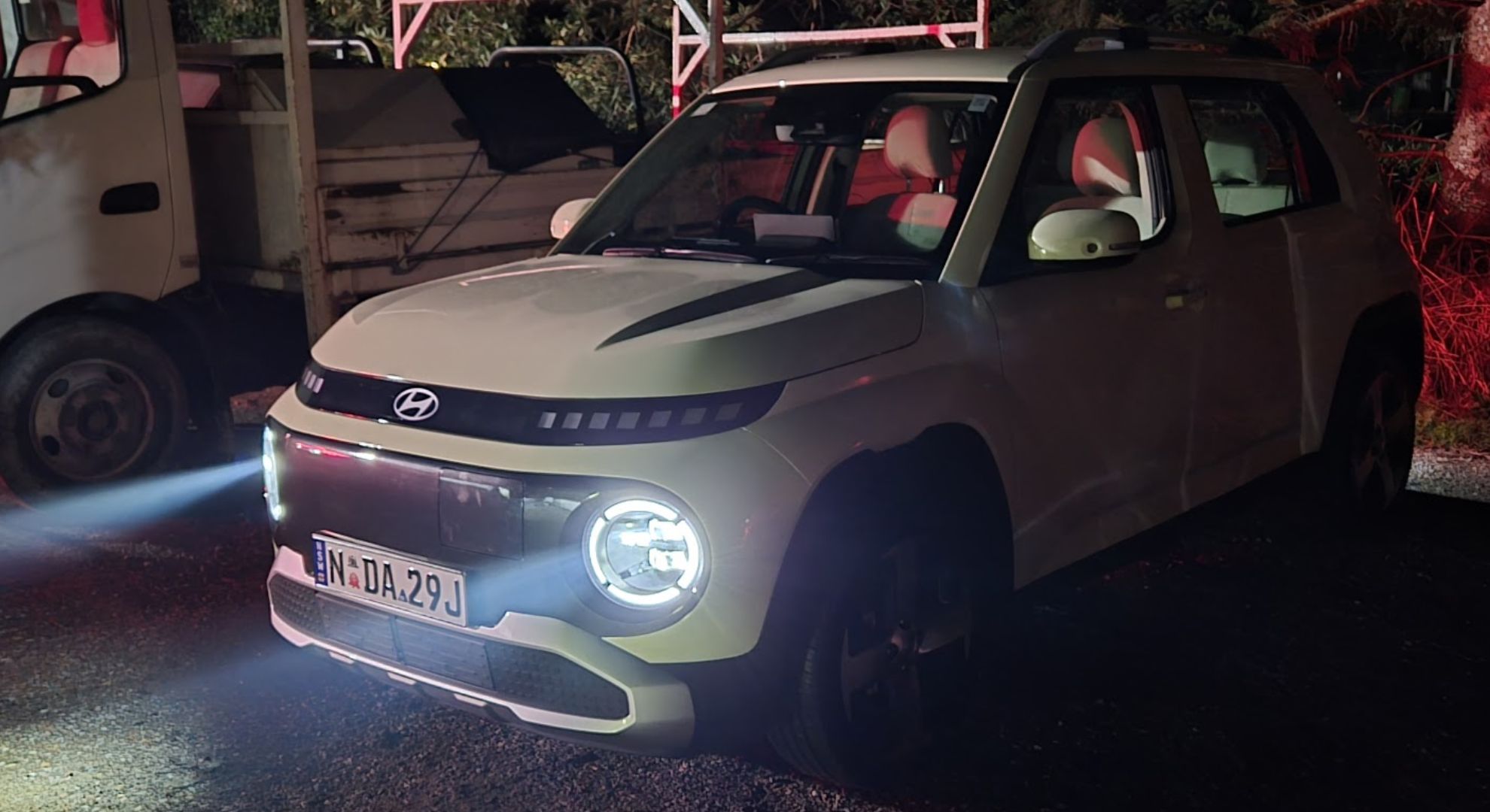 The Hyundai Inster at nighttime