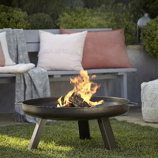 outdoor area with steel fire pit