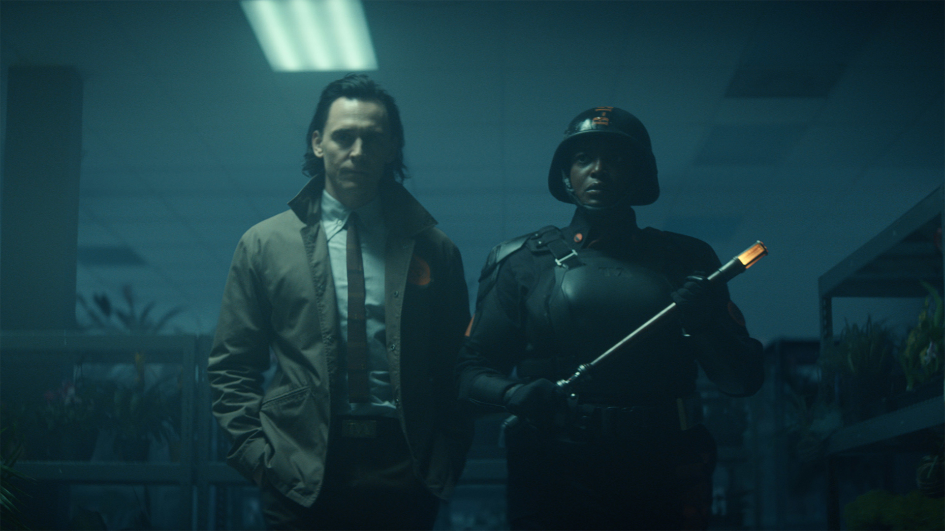 Loki and Hunter B-15 look at the camera in Loki season 1