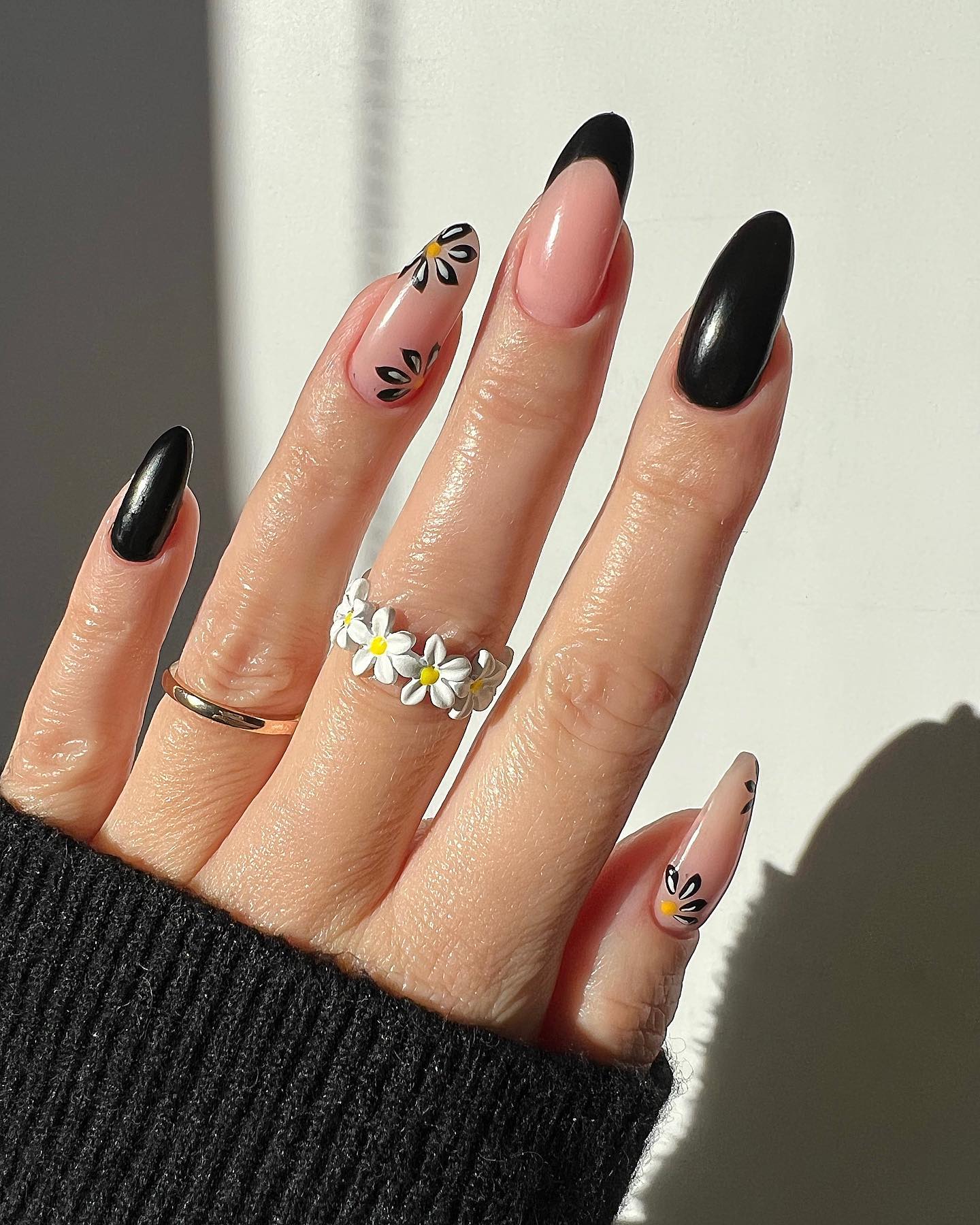 Black nail polish manicure design.