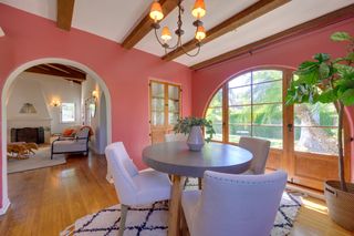 dining room with pink walls