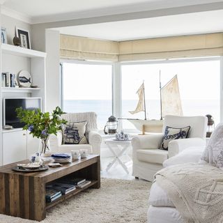 white apartment with ship model