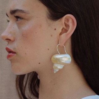 White statement conch earrings