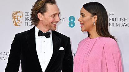 Tom Hiddleston and Zawe Ashton attend the EE British Academy Film Awards 2022 at Royal Albert Hall on March 13, 2022 in London, England