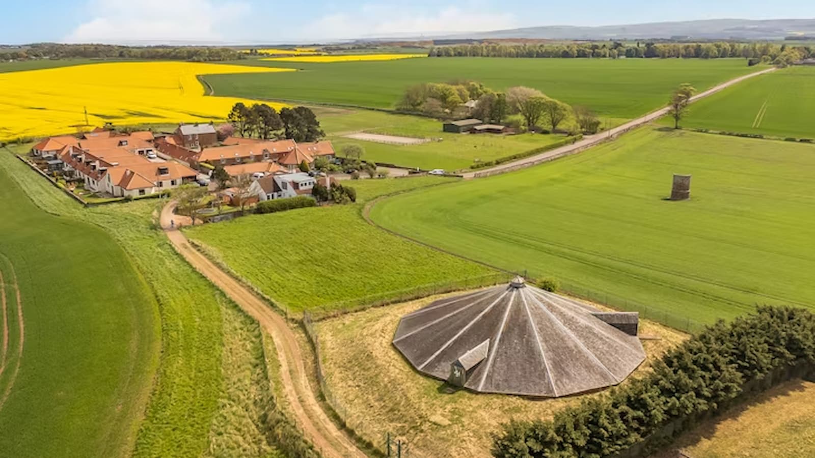 A water reservoir on a plot of green land