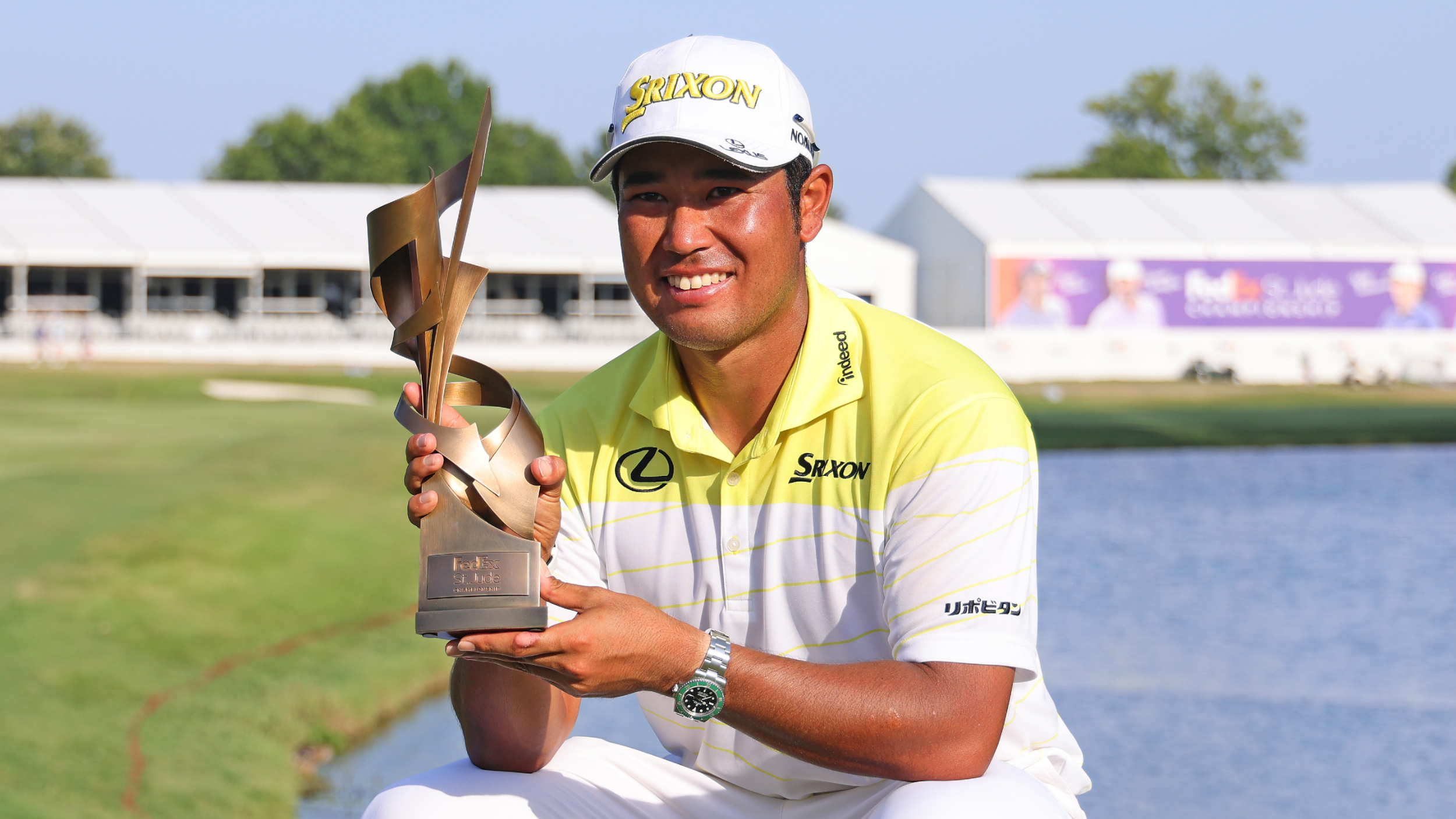Hideki Matsuyama with the FedEx St. Jude Championship trophy