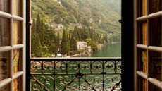 Doors opening to views of Lake Como in Italy.