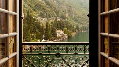 Doors opening to views of Lake Como in Italy.