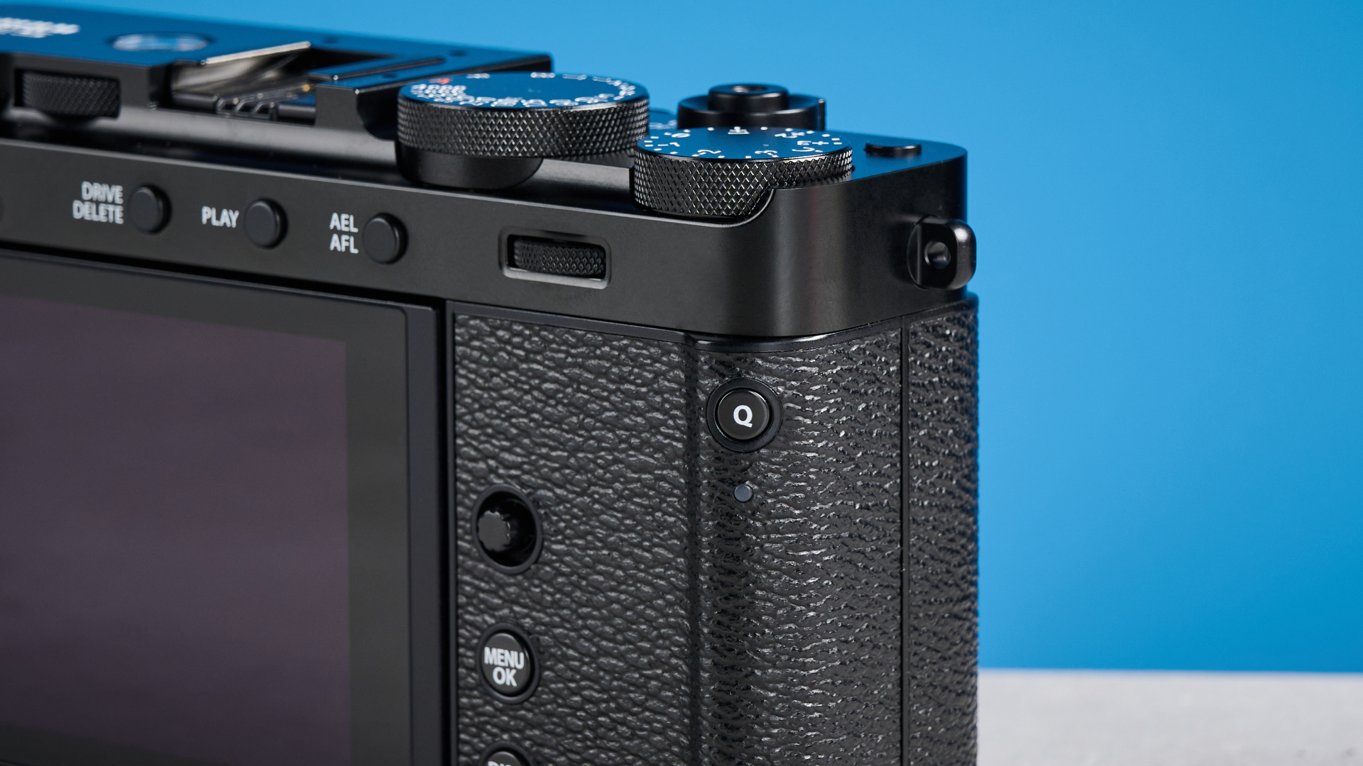 Fujifilm X-E5 rear rest against a blue background