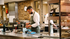 Chef Ben Wilkinson in the kitchen at The Pass at South Lodge