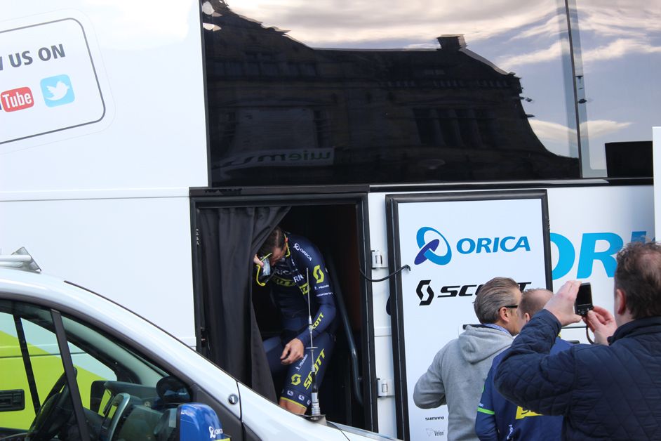 Paris-Roubaix champion Mat Hayman peeking out of the Orica-Scott bus