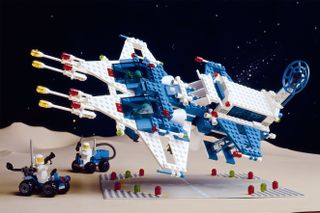 colorful toy bricks and people in space