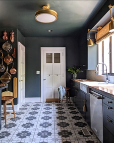 Ruth Jackson's completed kitchen makeover - a dark kitchen with tiled floors