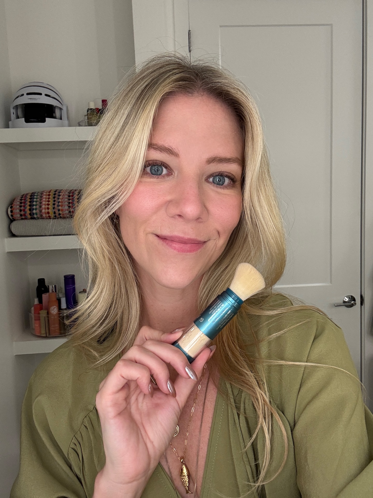 Brianna Peters tests Colorscience SPF powder.