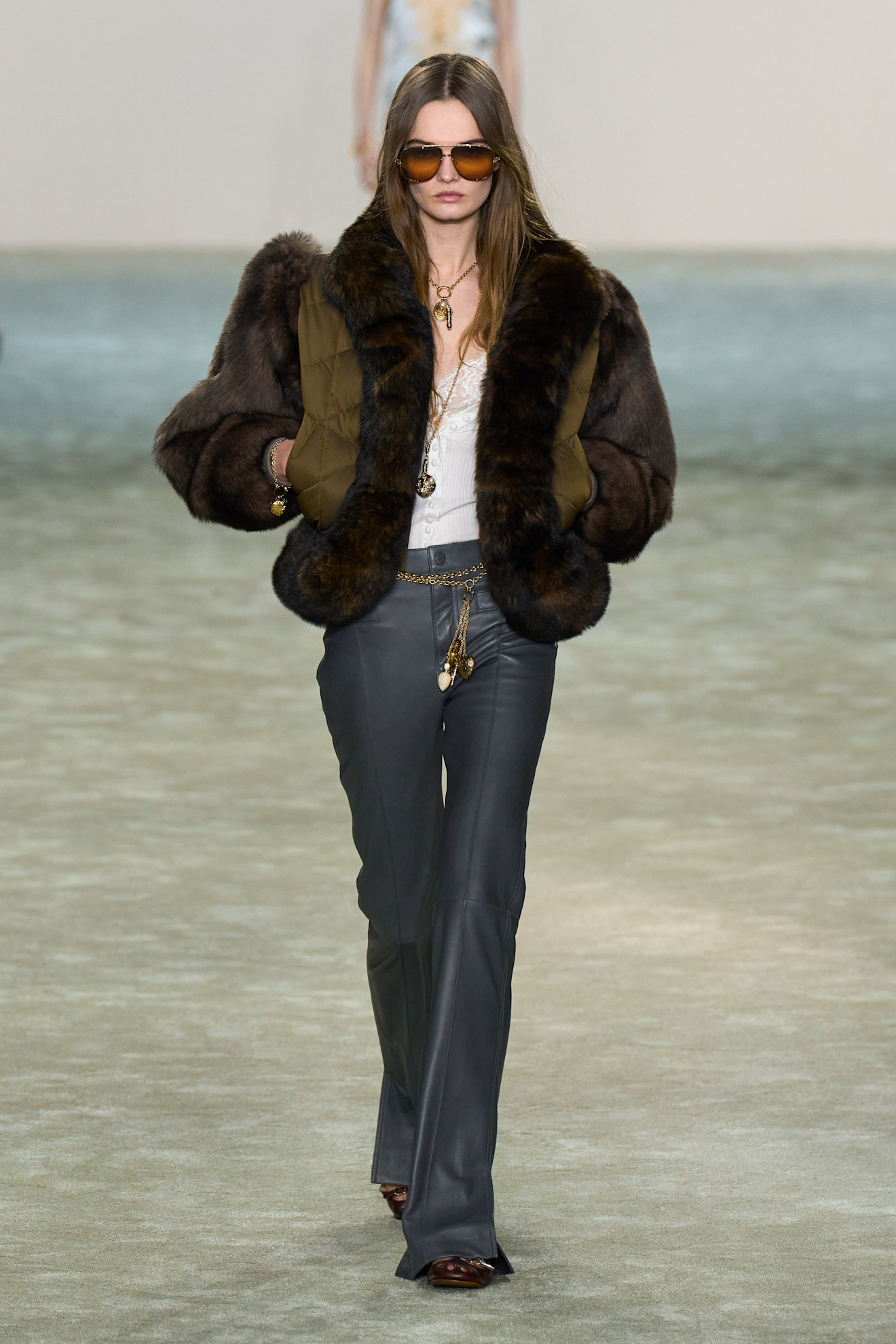 A model wore Miley Cyrus&#039;s Chlo&amp;eacute; Fall 2025 fur and leather look on the runway