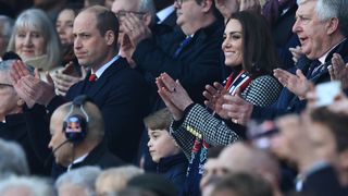 Catherine, Duchess of Cambridge with her son Prince George of Cambridge prior to the Guinness Six Nations Rugby match between England and Wales at Twickenham Stadium on February 26, 2022 in London, England.