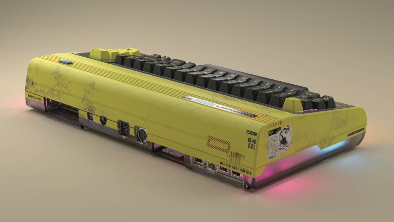 Side view of Commodore 77, with C64 ports at back and Cyberpunk 2077 faux stickers on side.
