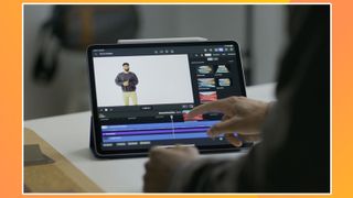 A photo of a person using an iPad to edit in Final Cut Pro